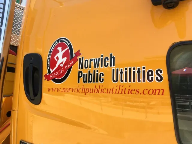 Utility worker inspecting infrastructure